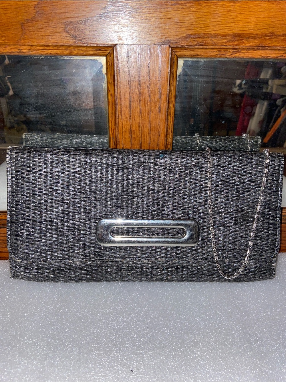 Big Buddha Black Woven Skinny Clutch with Silver Chain